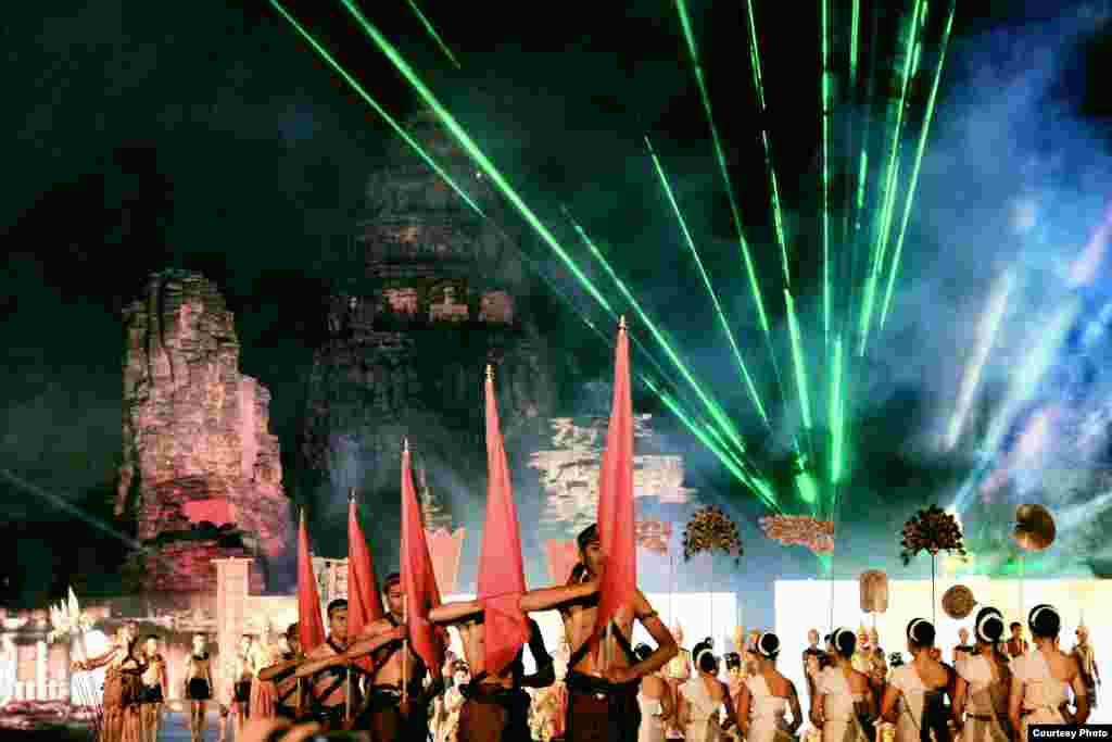 A light and sound show is staged at the ancient Khmer city of Phimai in Nakhon Ratchasima province, as part of an annual festival, Nov. 7, 2014. The event is held within the grounds of a temple at Phimai Historical Park, Thailand, which marks one end of the former Khmer highway from Angkor. (Photo taken by Matthew Richards/Thailand/VOA reader)