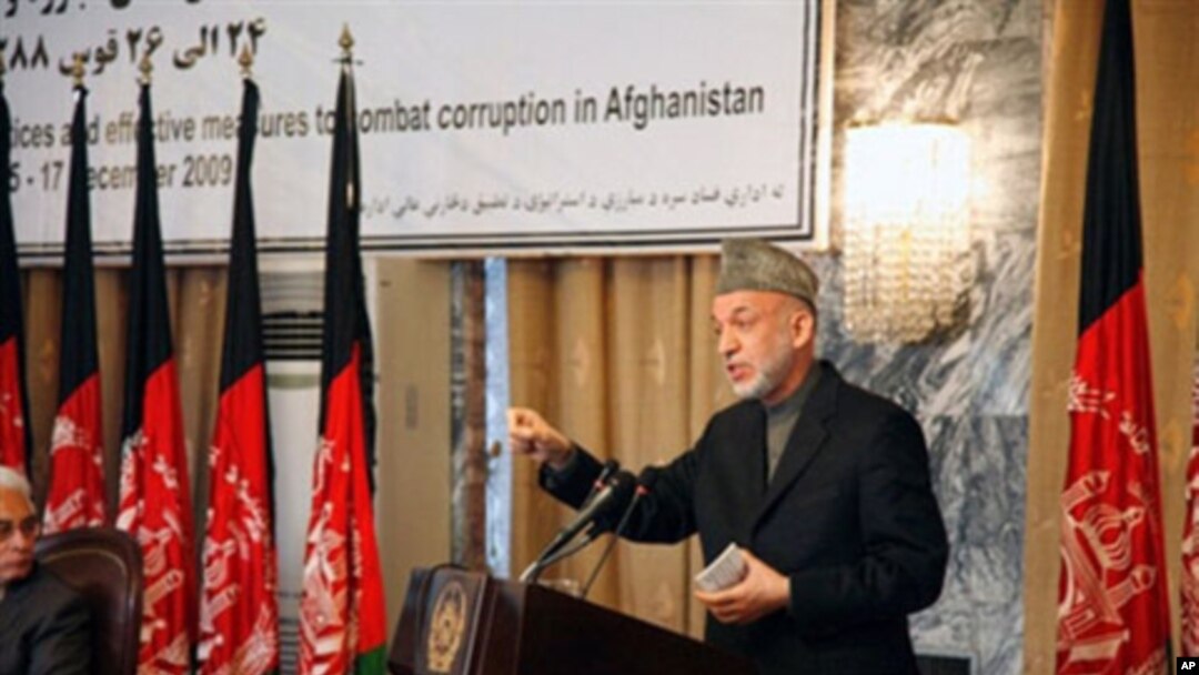 Handout photo of Afghan President Hamid Karzai speaking during an anti-corruption conference in Kabul on 15 Dec 2009