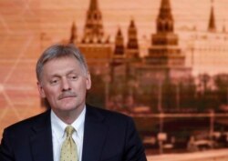 Kremlin spokesman Dmitry Peskov listens during Russian President Vladimir Putin's annual end-of-year news conference in Moscow, Russia December 19, 2019. REUTERS/Evgenia Novozhenina