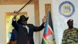 South Sudan President Salva Kiir waves to the delegates attending South Sudan Peace talks in Juba, South Sudan, Sept.9, 2019. Machar returned to meet with President Salva Kiir and held talks in preparation for the formation of a coalition government.