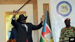 South Sudan President Salva Kiir waves to the delegates attending South Sudan Peace talks in Juba, South Sudan, Sept.9, 2019. Machar returned to meet with President Salva Kiir and held talks in preparation for the formation of a coalition government.