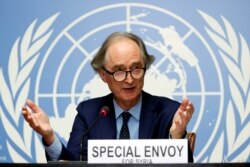 FILE - U.N. Special Envoy for Syria Geir Pedersen gestures during a news conference ahead of a meeting of the Syrian Constitutional Committee at the United Nations in Geneva, Aug. 21, 2020.