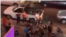 In this screen grab of a video shared on social media on July 15, 2021, Iranian protesters appear to confront police in southwestern Iran's Khuzestan province as part of a wave of demonstrations in the province against water shortages. 