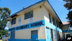 FILE—The Dandora Secondary school in the capital Nairobi, Kenya Monday, April 22, 2024. Students at a school next to Kenya's largest dumpsite are on a mission to try to purify the air with bamboo. 