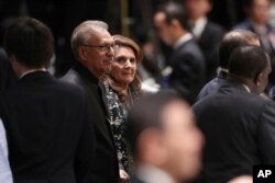 Pakistani President Arif Alvi and his wife Samina Alvi attend a banquet hosted by Japan's Prime Minister Shinzo Abe in Tokyo, Oct. 23, 2019.