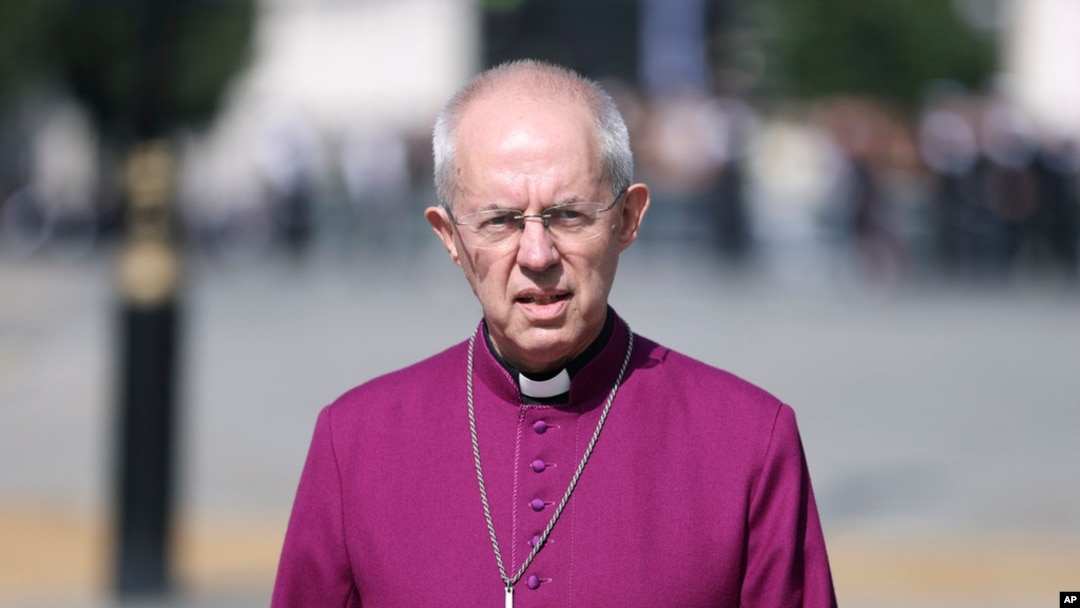 FILE - The Archbishop of Canterbury Justin Welby walks through Westminster in London on Sept. 14, 2022. 