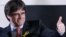 Carles Puigdemont, the dismissed president of Catalonia, arrives to speak after watching the results of Catalonia's regional election in Brussels, Belgium, Dec. 21, 2017.