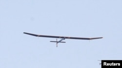 The Solar Impulse aircraft takes off from Moffett Field to begin the first leg of its 2013 Across America Mission in Mountain View, California, May 3, 2013.