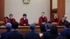 Acting head of the Constitutional Court Moon Hyung-bae and other judges arrive for the impeachment trial of South Korea's impeached President Yoon Suk Yeol at the Constitutional Court in Seoul, South Korea, Feb.18, 2025. 