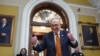 Senate Majority Leader Chuck Schumer celebrates as the Senate begins voting on the government funding bill just in time to meet the midnight deadline, at the Capitol in Washington, Dec. 20, 2024.