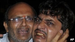 울부짖는 희생자 가족들