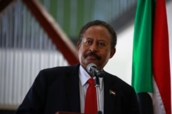 FILE - Sudanese Prime Minister Abdalla Hamdok addresses the press in Sudan's capital Khartoum, Aug. 15, 2020.