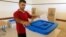 A Kurdish election officer prepares ballot boxes fora Sept. 25 independence referendum in Irbil, Iraq, Sept. 24, 2017. 