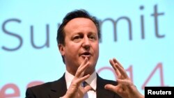 FILE - British Prime Minister David Cameron speaks at a UK Investment Summit in Newport, south Wales, Nov. 21, 2014.