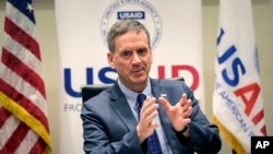 FILE - United States Agency for International Development (USAID) Administrator Mark Green, June 18, 2019.