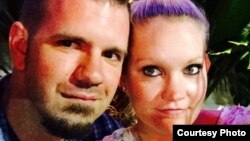 Ryan Gordon, left, and Jaime Gurnavage, plan to have a beach wedding in Florida Saturday despite Hurricane Matthew. They're shown in a photo posted in August on Gurnavage’s Facebook page. 