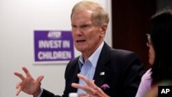 FILE - Sen. Bill Nelson, D-Fla., speaks during a roundtable discussion in Miami, Aug. 6, 2018. Nelson has told the Tampa Bay Times that Russian operatives have penetrated some of his state’s election systems ahead of this year’s midterms. But Florida state officials said Wednesday that they have no information to support the claim.