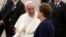Pope Francis walks with Brazil's President Dilma Rousseff upon arrival at Antonio Carlos Jobim International Airport in Rio de Janeiro, July 22, 2013. 