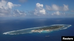 FILE - An aerial view shows of Itu Aba, which the Taiwanese call Taiping, in the South China Sea, Nov. 29, 2016. 