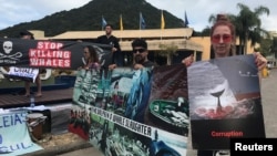 Activists attend a protest during the International Whaling Commission (IWC) conference in Florianopolis, Brazil, Sept. 10, 2018. 