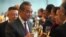 China's Foreign Minister Wang Yi toasts with Nauru diplomats after signing the joint communiqué on the resumption of diplomatic relations between the People's Republic of China and the Republic of Nauru at the Diaoyutai State Guesthouse in Beijing on Jan. 24, 2024.