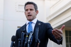 FILE - Rep. Adam Kinzinger, R-Ill., speaks to the media, at the White House in Washington.