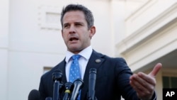 FILE - Rep. Adam Kinzinger, R-Ill., speaks to the media, at the White House in Washington. 