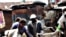 Urban farmers growing vegetables in a slum of Nairobi, Kenya.