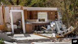 Damage to a home ravaged by Hurricane Helene is pictured Oct. 1, 2024, in Morganton, N.C. The adjacent Catawba River flooded because of torrential rains, destroying this and six other homes nearby.