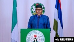 FILE - Nigerian President Muhammadu Buhari addresses the nation over the coronavirus disease (COVID-19), in Abuja, Nigeria April 13, 2020.