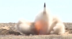 FILE - A still image, taken from a video footage and released by Russia's Defense Ministry on Aug. 31, 2019, shows a nuclear-capable short-range Iskander missile at the Kapustin Yar military shooting range near Astrakhan, Russia.