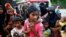 New Rohingya refugees arrive near the Kutupalang makeshift Refugee Camp, in Cox’s Bazar, Bangladesh, Aug. 29, 2017. 