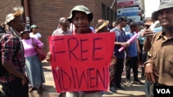 Some of the people who protested outside the High Court demanding Ndiweni's release from prison.