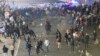 Israeli police disperse demonstrators blocking a highway during a protest against plans by Prime Minister Benjamin Netanyahu's government to overhaul the judicial system in Tel Aviv, Israel, Monday, March 27, 2023. (AP Photo/Oren Ziv)
