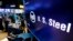 FILE - The logo for U.S. Steel appears on a screen above the trading floor of the New York Stock Exchange, in New York, Oct. 31, 2017.
