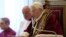 In this photo provided by the Vatican newspaper L'Osservatore Romano, Pope Benedict XVI announces his resignation during a meeting of Vatican cardinals at the Vatican on February 11, 2013. 