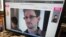 A picture of Edward Snowden, a contractor at the National Security Agency (NSA), is seen on a computer screen displaying a page of a Chinese news website on June 13, 2013.