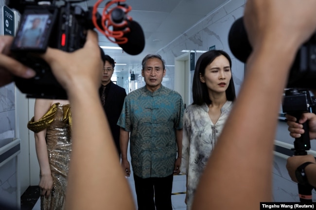 Actors on a set of a micro movie during a filming session at a hospital, in Zhengzhou, Henan province, China July 17, 2024. REUTERS/Tingshu Wang