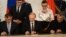 Ruski predsednik Vladimir Putin i predstavnici krimskih vlasti potpisuju sporazum o pripajanju Krima Rusiji