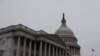 FILE - Morning breaks over the U.S. Capitol dome on the first day of the new Congress, in Washington on Jan. 03, 2023.