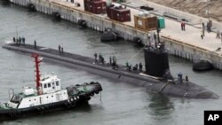 En esta foto del sábado 9 de julio de 2011, el submarino nuclear estadounidense USS Texas llega a una base naval de Corea del Sur en Busan, Corea del Sur, como parte de un despliegue regular en el Pacífico.
