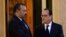 French President Francois Hollande, right, accompanies Morocco's King Mohammed VI as he leaves after a meeting at the Elysee Palace in Paris, Nov. 20, 2015. 