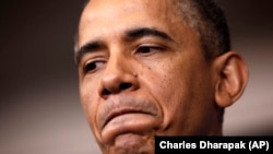 President Barack Obama pauses as he answers questions during his new conference in the Brady Press Briefing Room of the White House in Washington, Tuesday, April 30, 2013. 