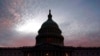 The U.S. Capitol is seen at sunset, Jan. 5, 2022, in Washington. Thursday marks the first anniversary of the Capitol insurrection, a violent attack that has fundamentally changed Congress and prompted widespread concerns about the future of American democracy.