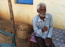 FILE - Rescued bonded laborer Srikrushna Rajhansiya recalls his days in bondage outside his home in Sargul village in the eastern Indian state of Odisha, Aug. 31, 2016.