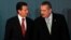FILE - Mexico's President-elect Enrique Pena Nieto (L) and Congressman Manlio Fabio Beltrones attend a meeting with newly elected senators and lawmakers of the Institutional Revoluntionary Party (PRI) in Mexico City, Aug. 9, 2012. 