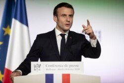 French President Emmanuel Macron, delivers a speech during his visit in Mulhouse, eastern France, Feb. 18, 2020.