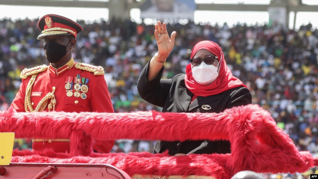 Tanzania’s President Samia Suluhu Hassan (R) attends the 60th anniversary of independence day ceremony at the National Stadium in Dar es Salaam, Tanzania, on December 9, 2021.