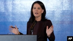 German Foreign Minister Annalena Baerbock speaks during a press briefing at a hotel in Beijing, Dec. 2, 2024.