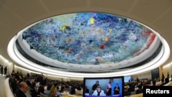 FILE - U.N. High Commissioner for Human Rights Michelle Bachelet is seen at a session of the Human Rights Council at the United Nations in Geneva, Switzerland, March 6, 2019.